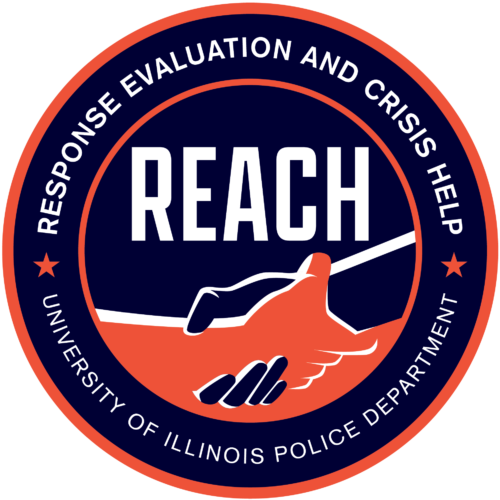 Image of the REACH logo -- two hands grasped together below the letters REACH in the center of a circle. The outer circle reads, Response, Evaluation and Crisis Help - University of Illinois Police Department.