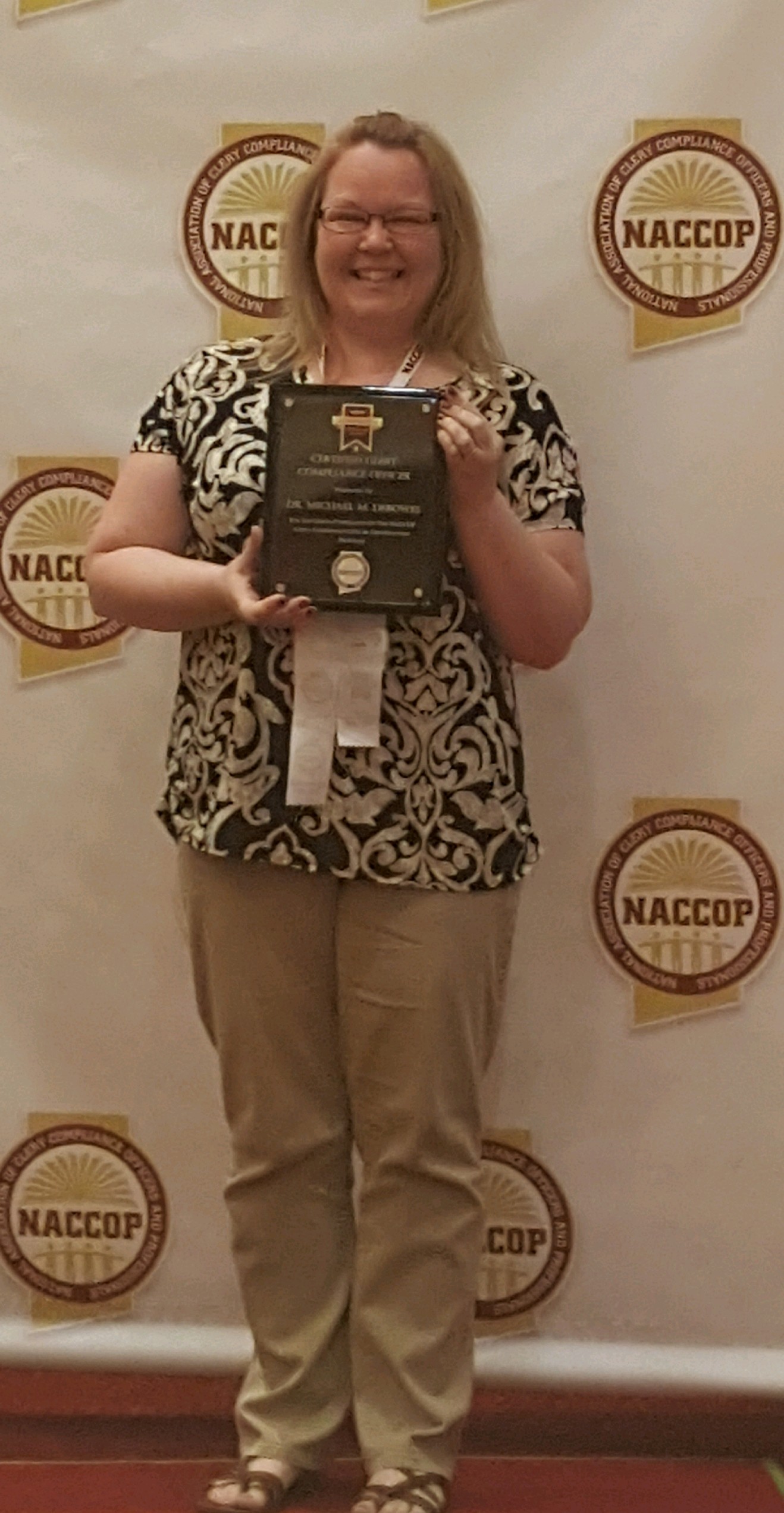 Compliance coordinator Jennifer Payan receiving Clery Compliance Officer certification from the National Association of Clery Compliance Officers and Professionals.