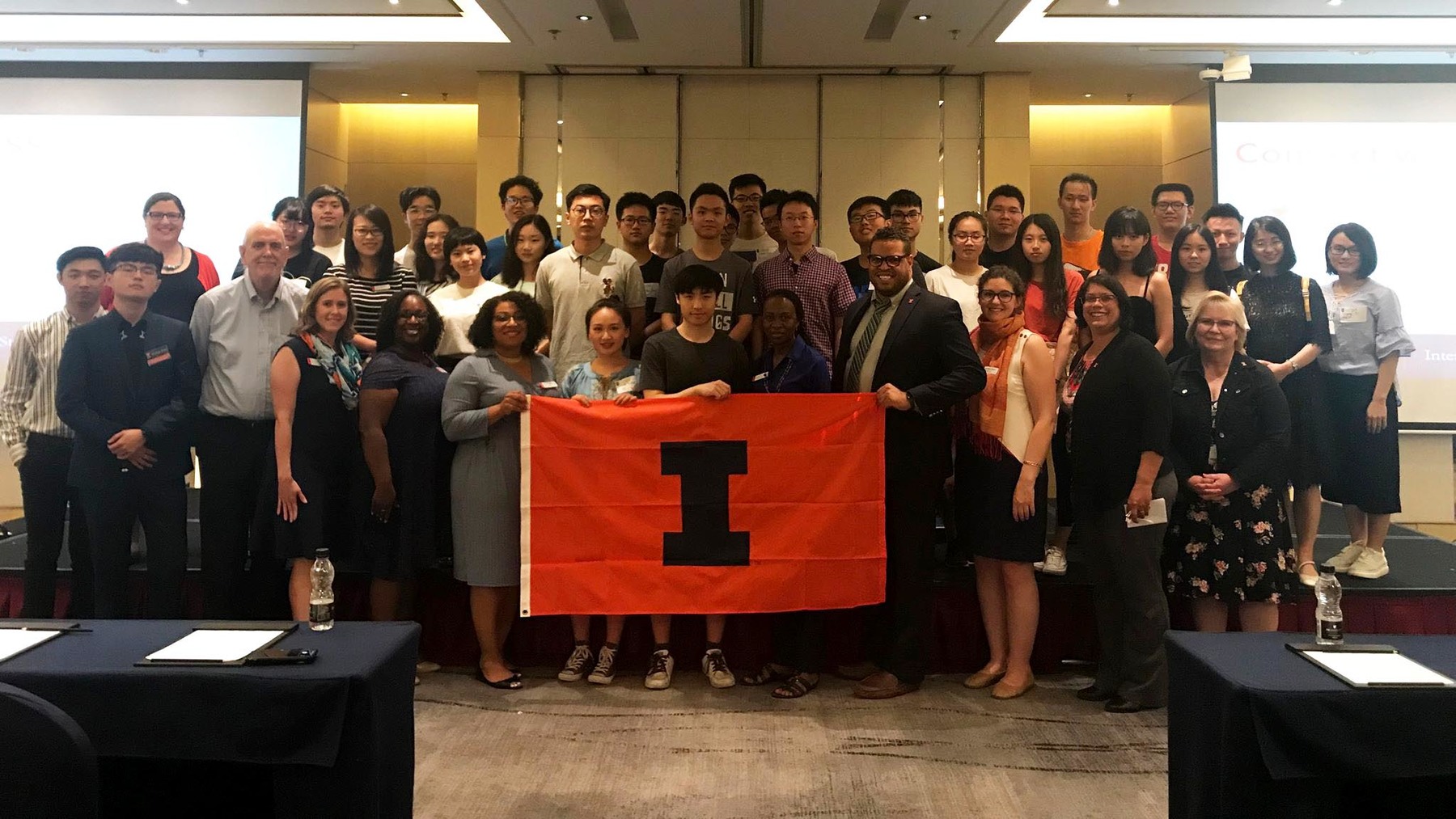 Lt. Joan Fiesta in China and South Korea assisting with the university's pre-arrival orientation sessions for incoming international students.